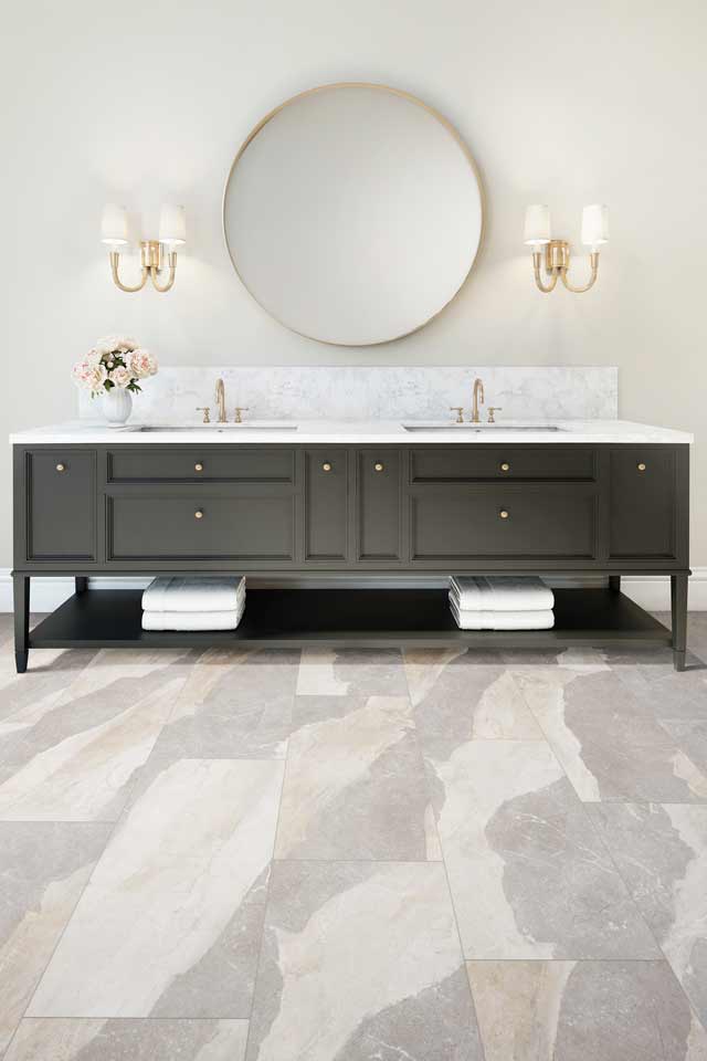 stone-look luxury vinyl in modern bathroom with gold accents